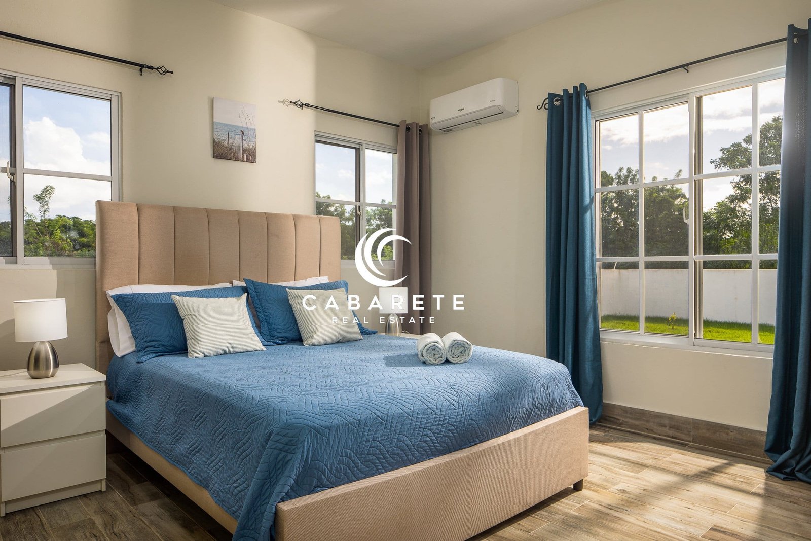 Beautiful tropical villa with private swimming pool, lush yard, and covered terrace in secure Cabarete community