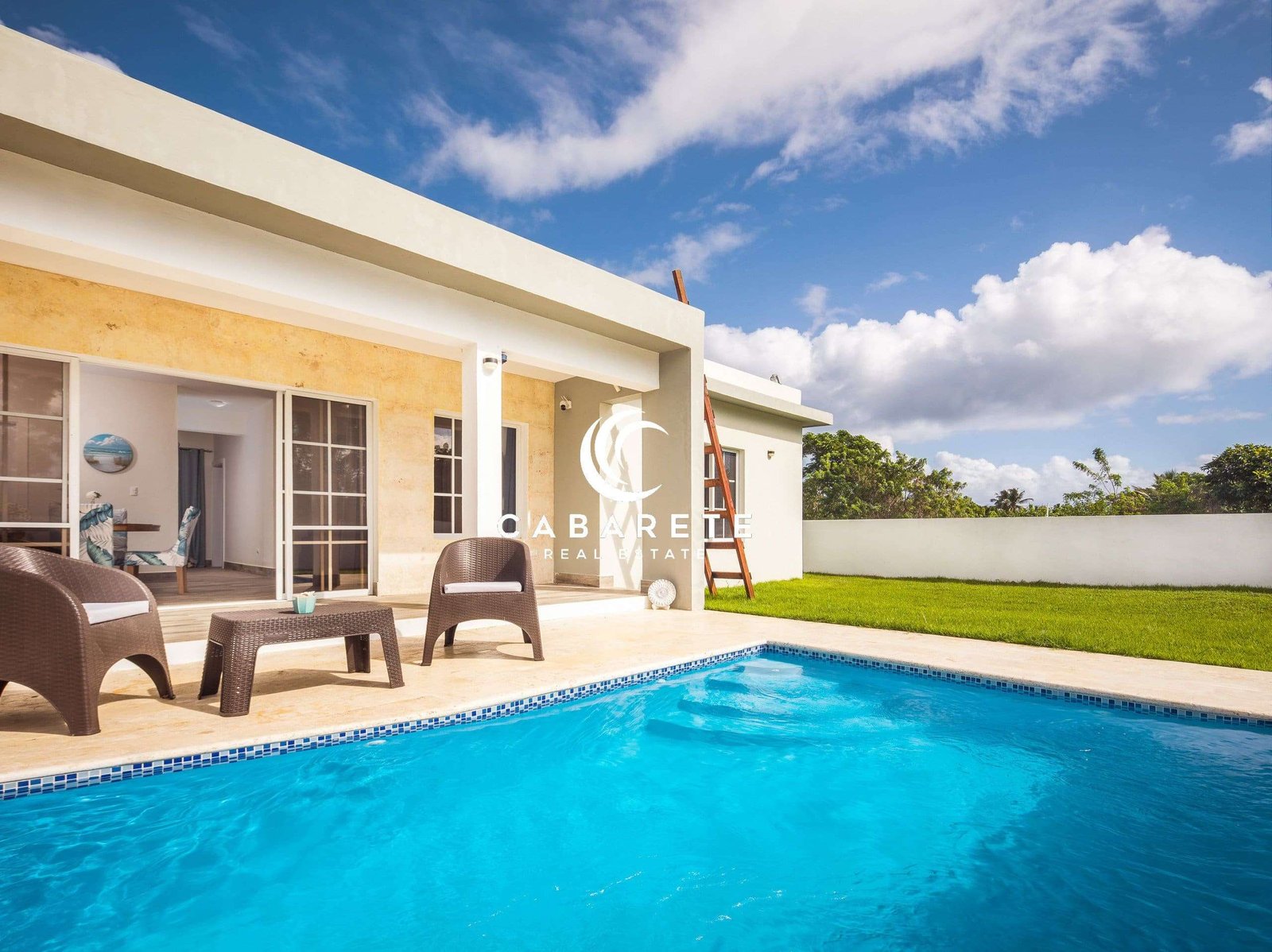 Stylish villa featuring a spacious outdoor living area, private pool, and lush garden, offering the perfect tropical escape