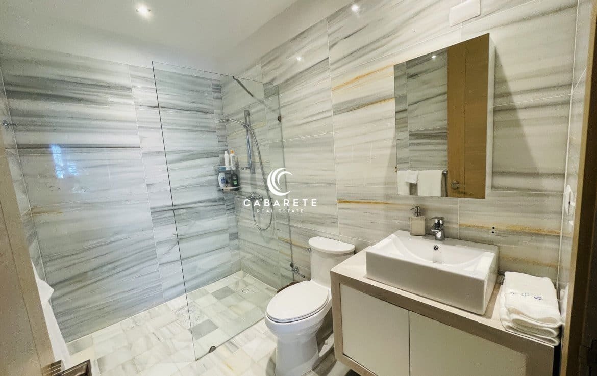 Modern 3-bedroom apartment with a private terrace overlooking the beach