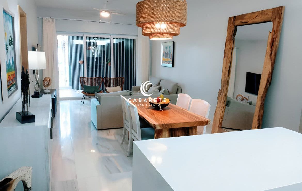 Modern 3-bedroom apartment with expansive balcony overlooking the turquoise waters of the Cabarete coastline