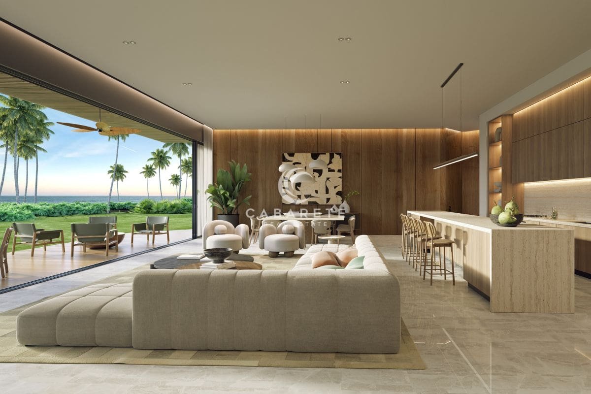 Cabarete Real Estate presents a stunning oceanfront living room at Atlantic View, a luxurious condo complex in Punta Goleta, Cabarete, Dominican Republic