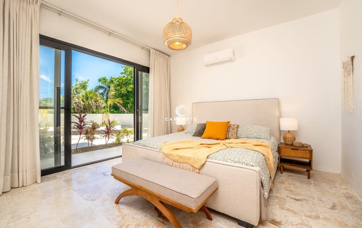 Spacious Bedroom with Patio Access in Cabarete Apartment