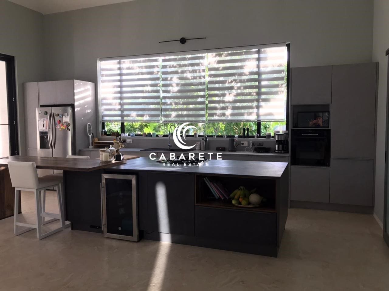 High-end Nobilia kitchen in a luxury home in Sosua, Dominican Republic, featuring modern appliances and a central island.