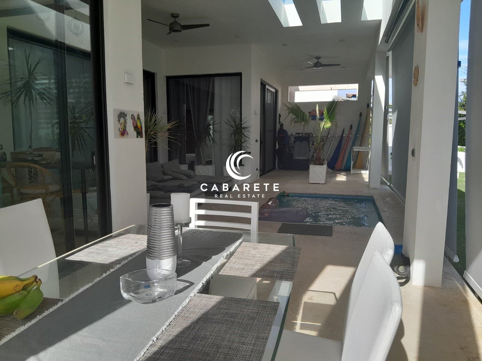 Luxury family home in Sosua, Dominican Republic, featuring 3 bedrooms, spacious living areas, and lush outdoor gardens.