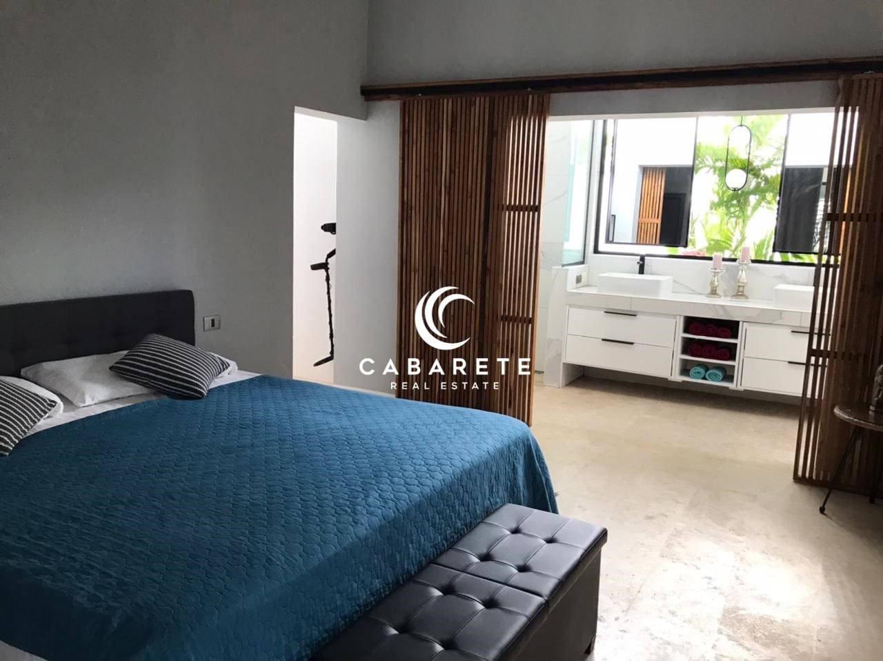 Spacious luxury villa in Sosua Ocean Village, Dominican Republic, featuring high ceilings and abundant natural light.