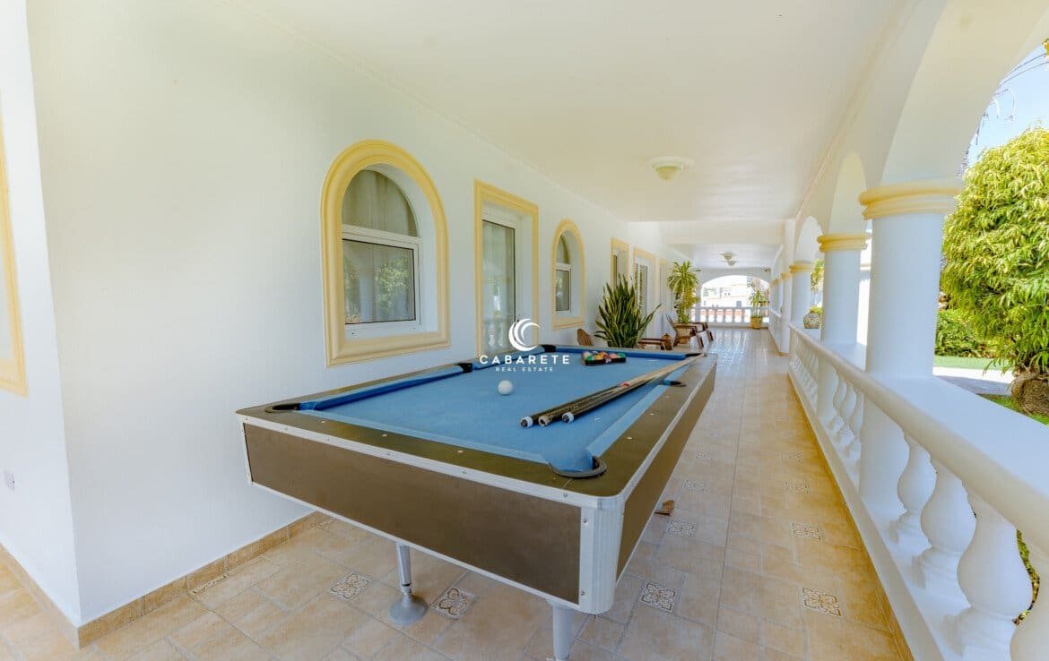 Private driveway and covered carport for added convenience. #PrivateParking #CabareteVilla #SecureLiving
