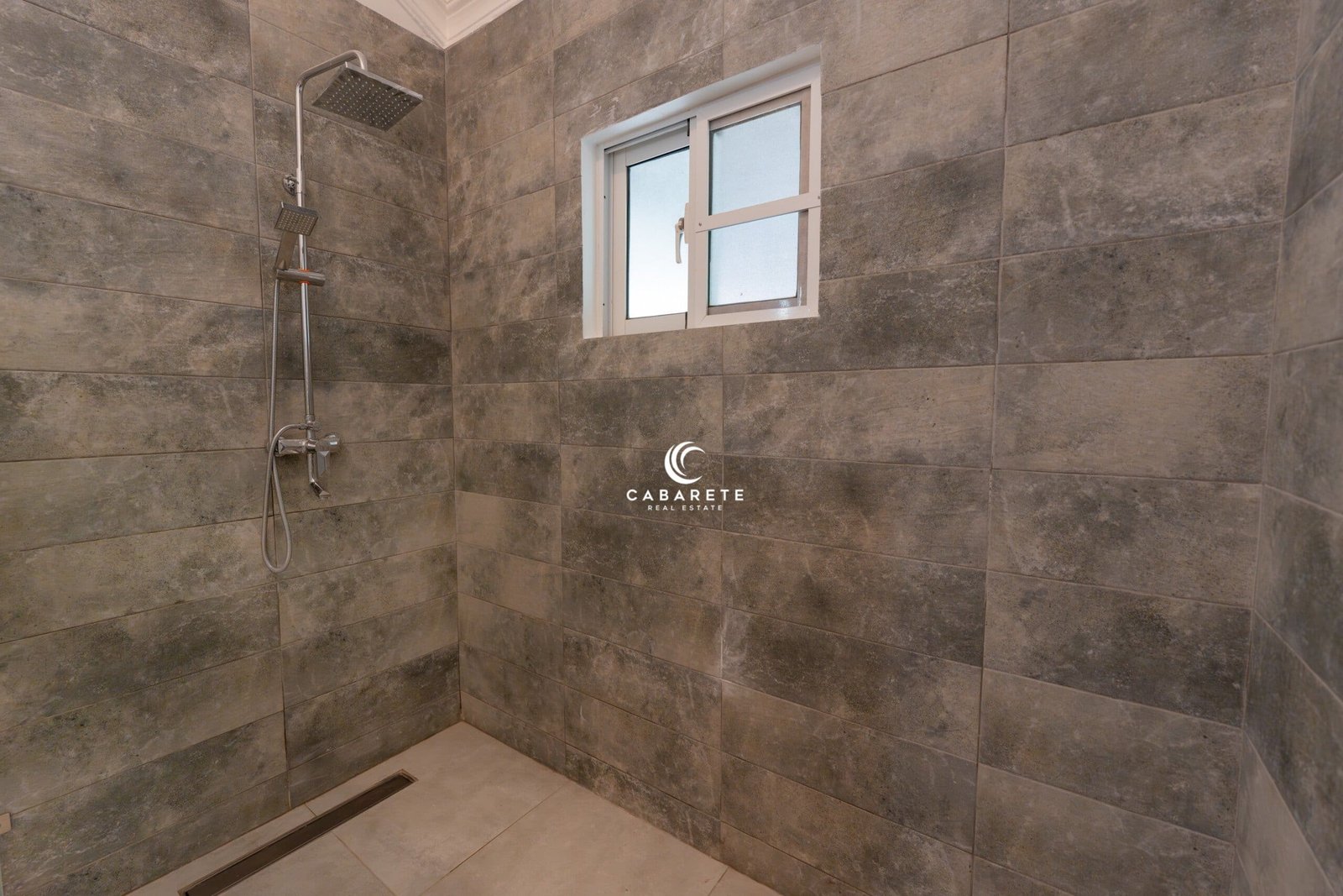 Updated villa with natural light, lush garden, and serene neighborhood ambiance. #CabareteEast #HomeForSaleDR #TropicalProperty