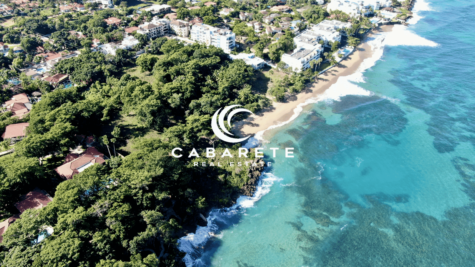 Scenic coastal lot with direct access to turquoise waters and soft sand in Playa Laguna