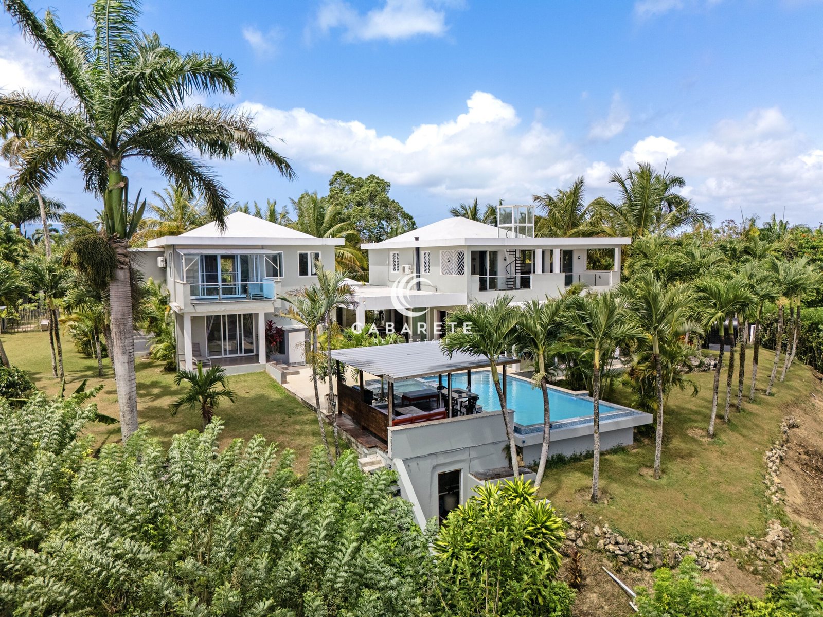 A private estate for sale in the Dominican Republic featuring panoramic 360° views of the ocean and mountains.