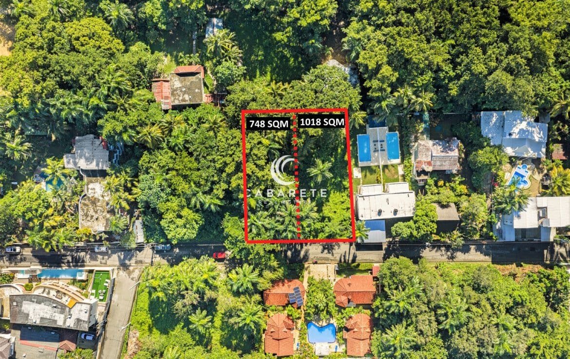 Land for sale in ProCab Cabarete inside a gated community with mature trees and easy road access