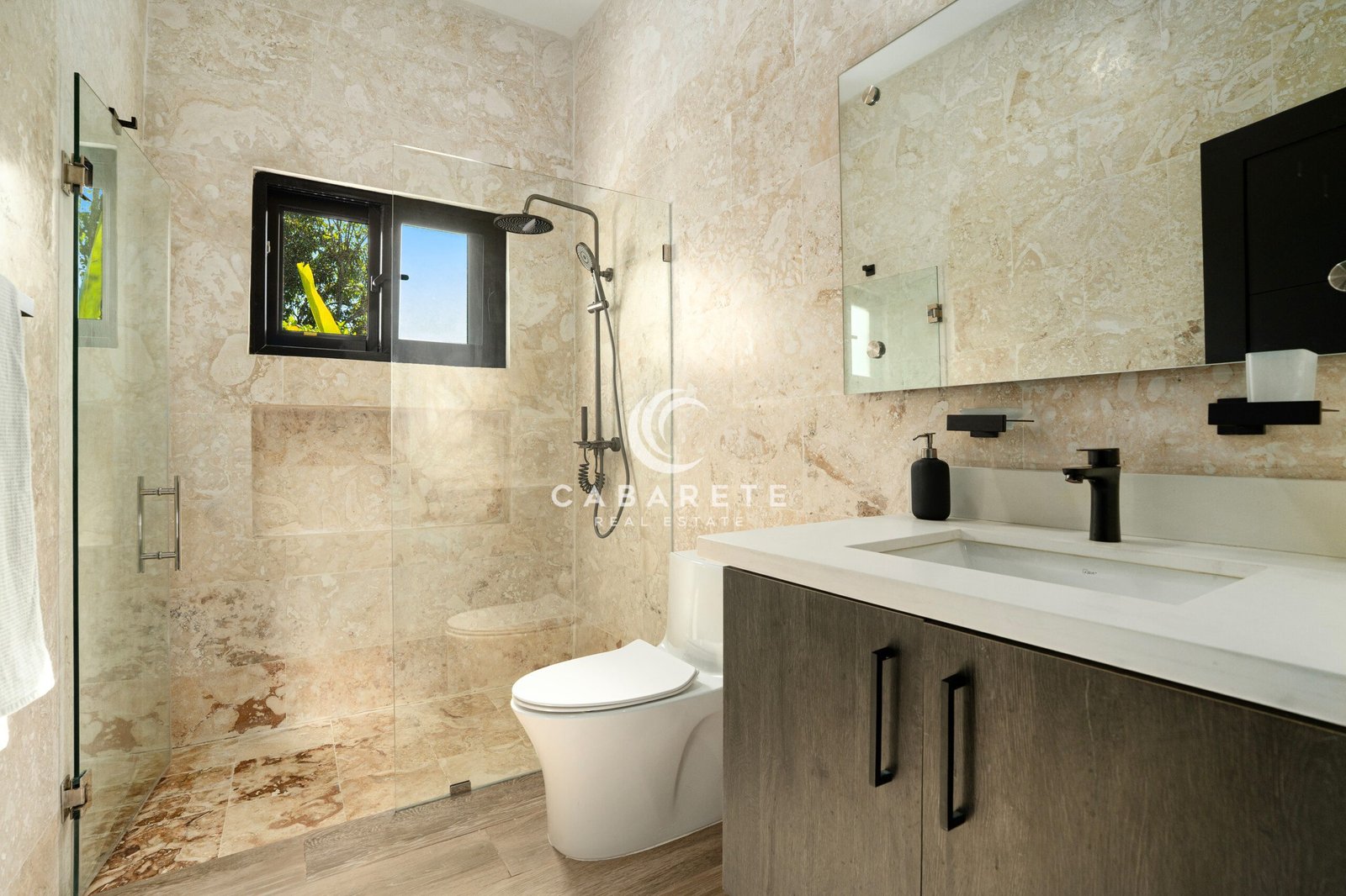 modern bathroom beige stone tiled shower rainfall showerhead