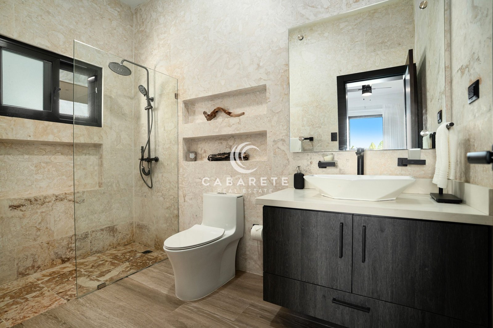 modern bathroom glass shower beige marble black fixtures