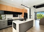 modern kitchen matte gray island wood glossy cabinets living area