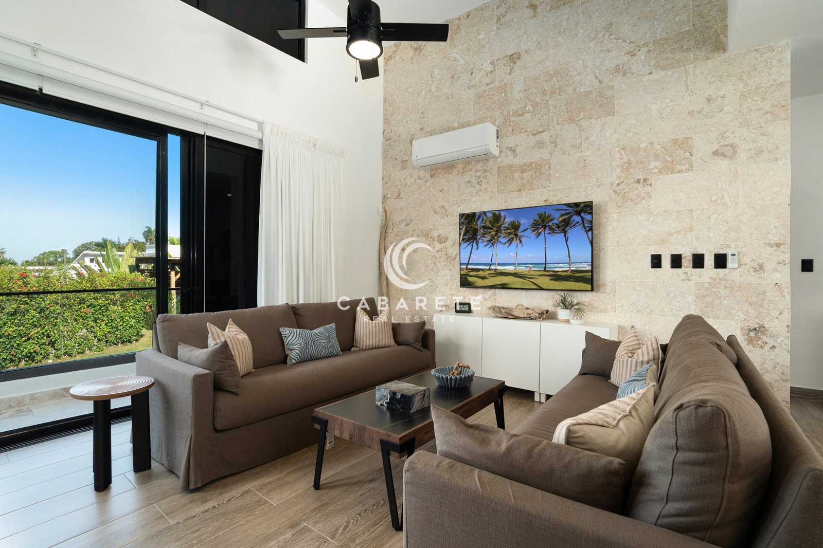 modern living room stone wall flat screen tv sliding door