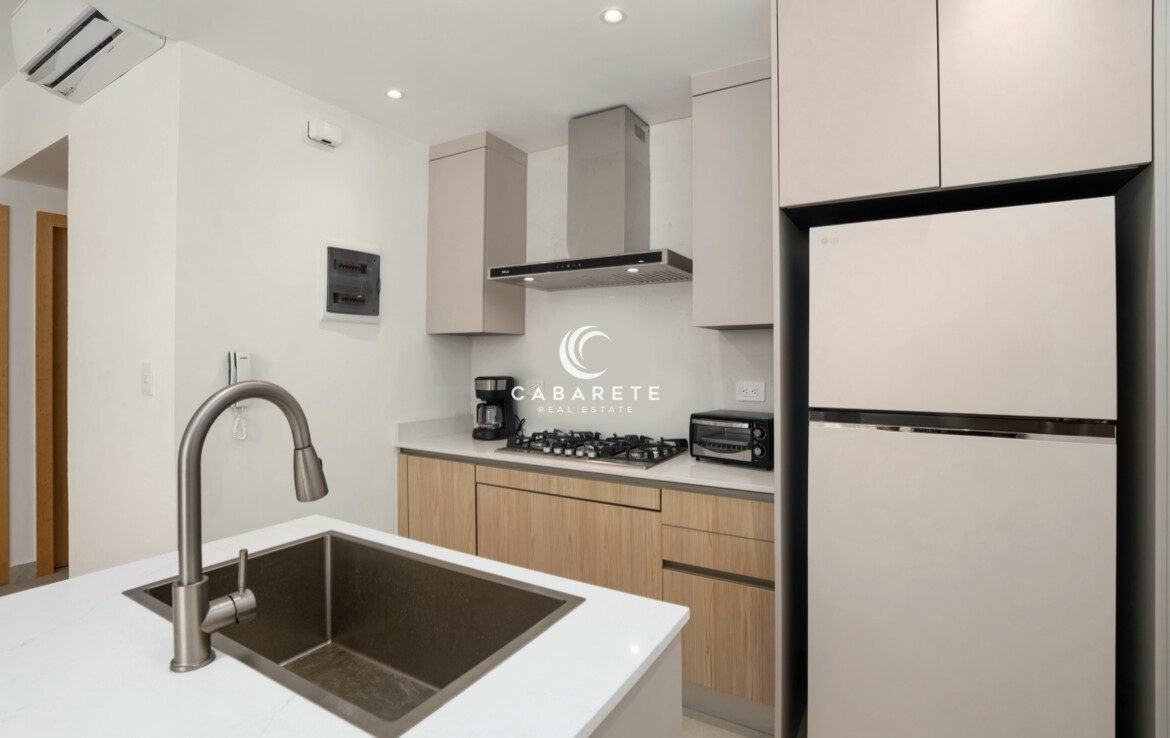 Open-concept kitchen with island dining at Mareal