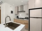 Open-concept kitchen with island dining at Mareal