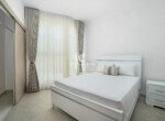 Queen bedroom in Mareal condominium