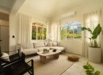 Open-concept living area in gated community villa