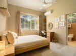 Guest bedroom in Encuentro gated community villa