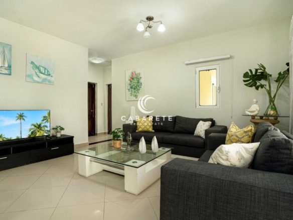 Living room of 2 bedroom garden condo in Pro Cab 1170x738