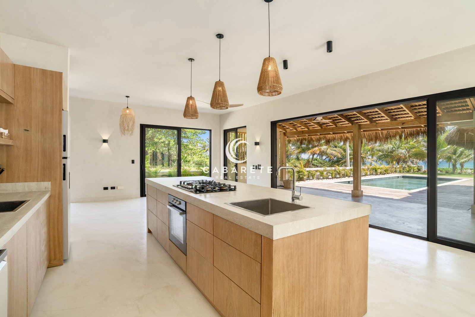 Modern kitchen with wood cabinetry and large center island