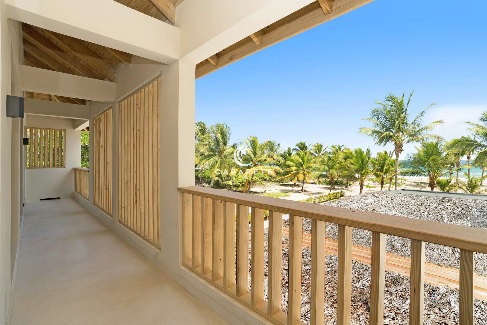 Primary bedroom with private balcony and ocean views in Cabarete