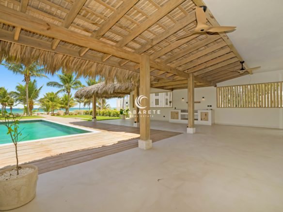 Luxury villa living area opening to private pool and terrace