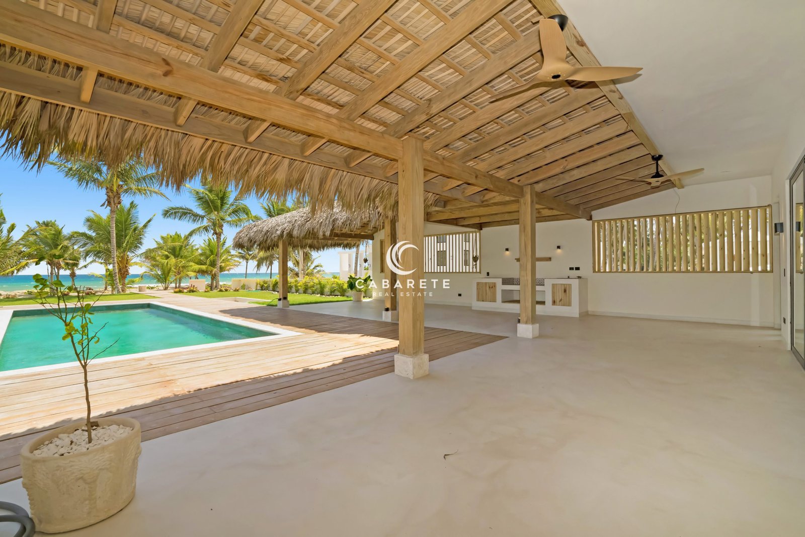 Luxury villa living area opening to private pool and terrace