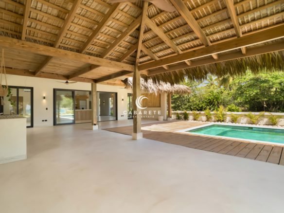 Luxury villa living area opening to private pool and terrace