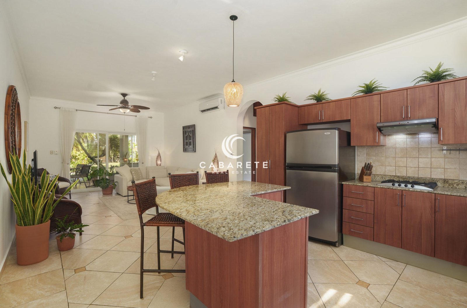 Fully equipped kitchen with granite peninsula in Ocean Dream Cabarete condo