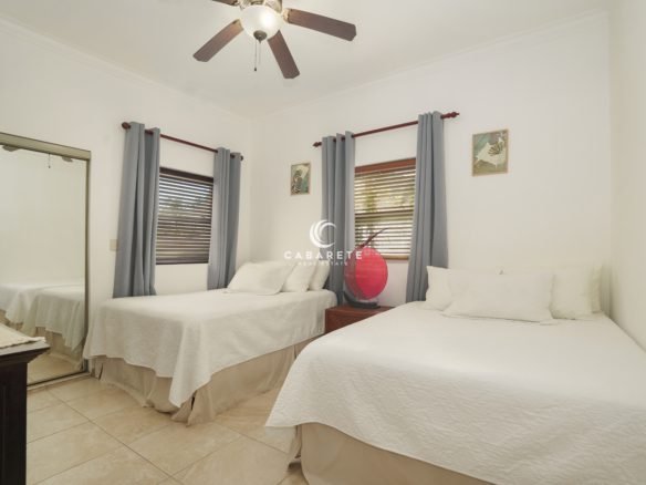 Furnished guest bedroom in Ocean Dream 2-bedroom condo