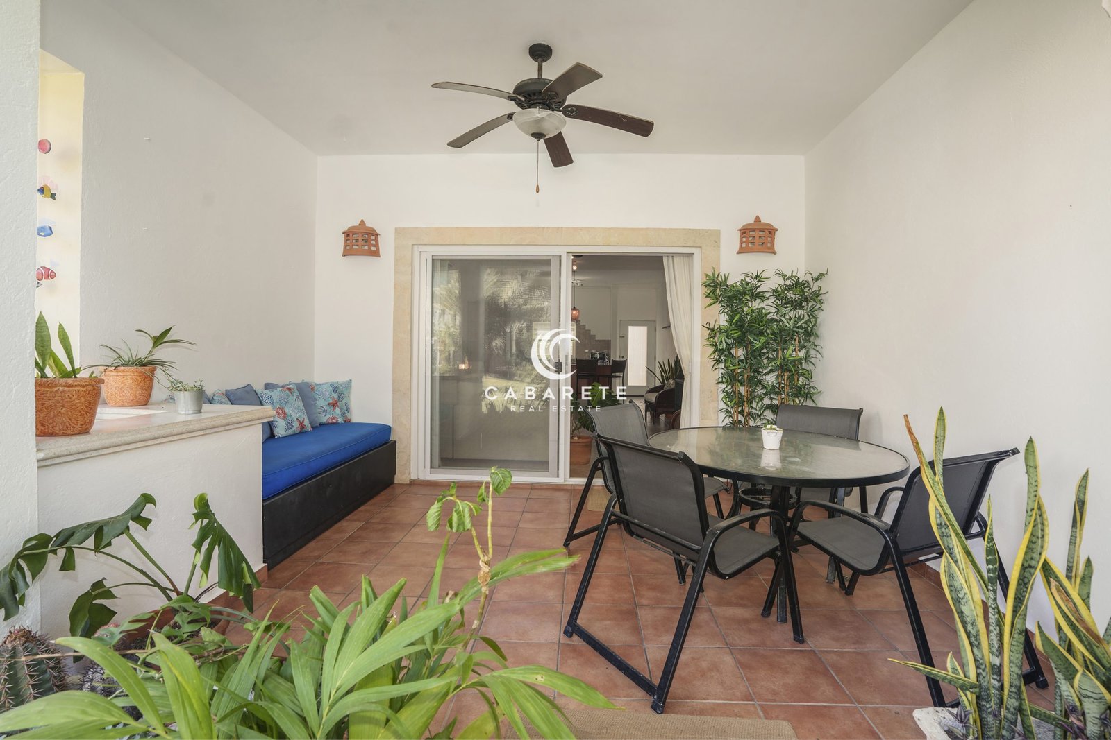 Private covered terrace facing tropical gardens at Ocean Dream Cabarete